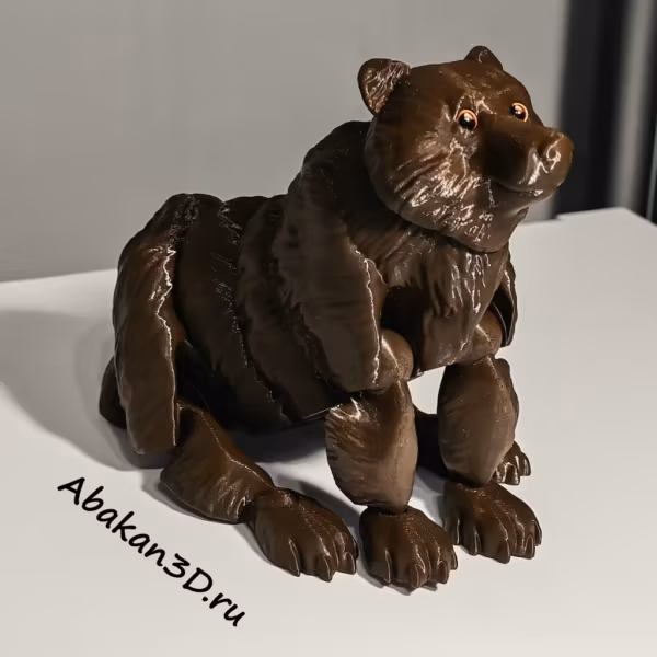 Подвижный медведь сидя