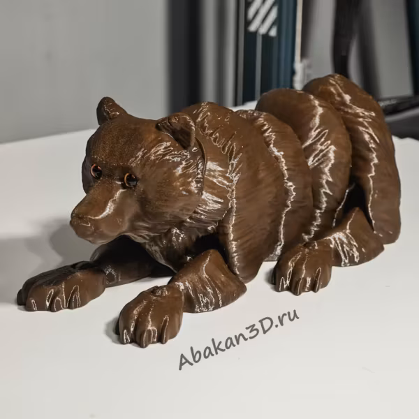 Подвижный медведь лежа